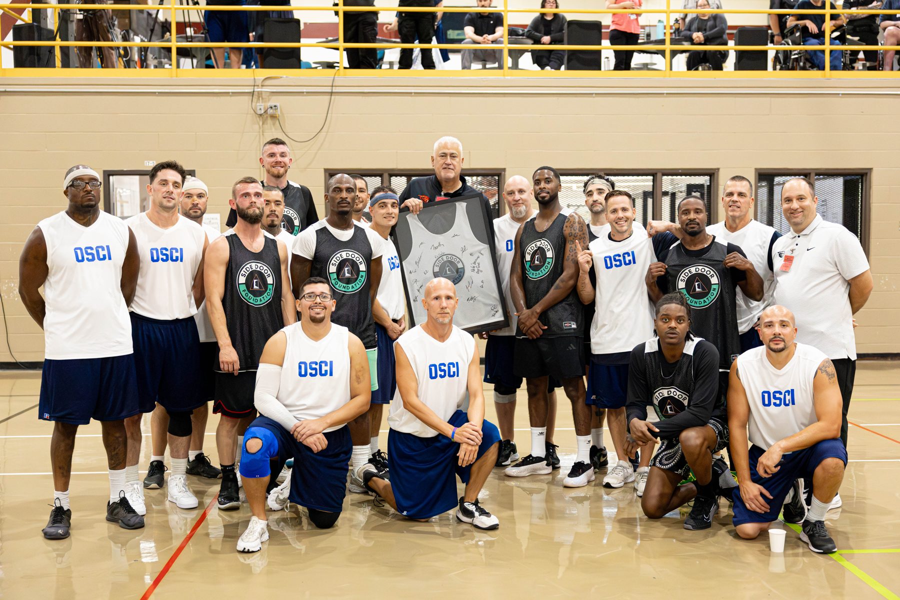 The Side Door team and participants together after an event